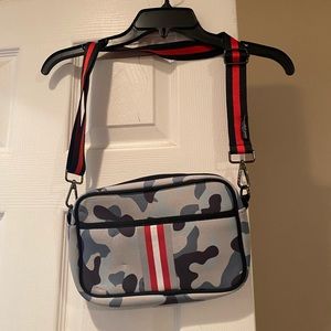 Neoprene crossbody bag. New w/o tags. Never used.